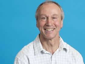 Mark Huxham staff portraits Sighthill. Blue Background Oct 2022