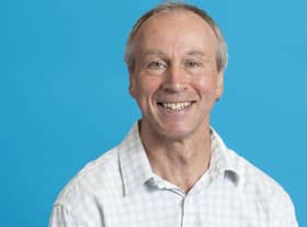Mark Huxham staff portraits Sighthill. Blue Background Oct 2022