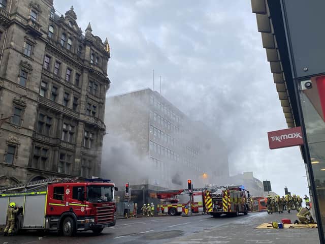 Thick smoke could be seen emerging from the Edinburgh landmark as fire crews fought to bring the blaze under control. Picture: Gillian Webster/SWNS