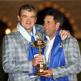 Paul Lawrie celebrates with captain Jose Maria Olazabal after Europe's dramatic win in the 2012 Ryder Cup at Medinah Country Club. Picture: Ross Kinnaird/Getty Images.
