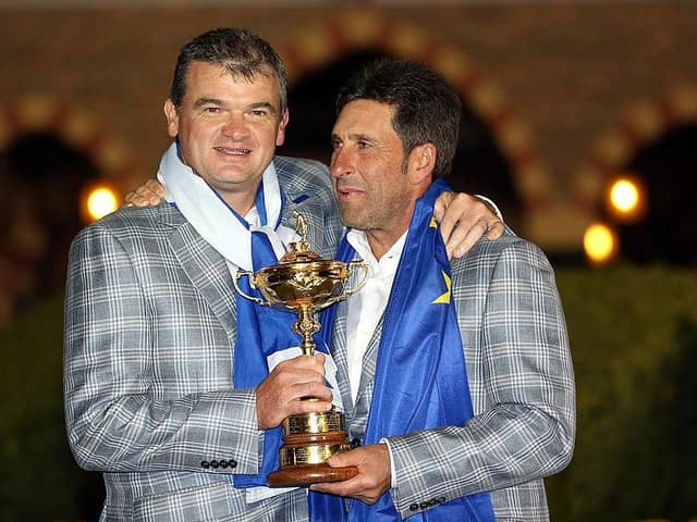 Paul Lawrie celebrates with captain Jose Maria Olazabal after Europe's dramatic win in the 2012 Ryder Cup at Medinah Country Club. Picture: Ross Kinnaird/Getty Images.