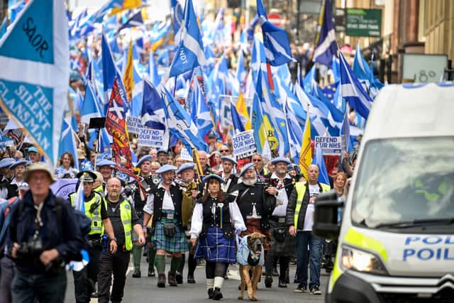 Members of All Under One Banner gather for an independence march and rally in May this year. (Photo by Jeff J Mitchell/Getty Images)