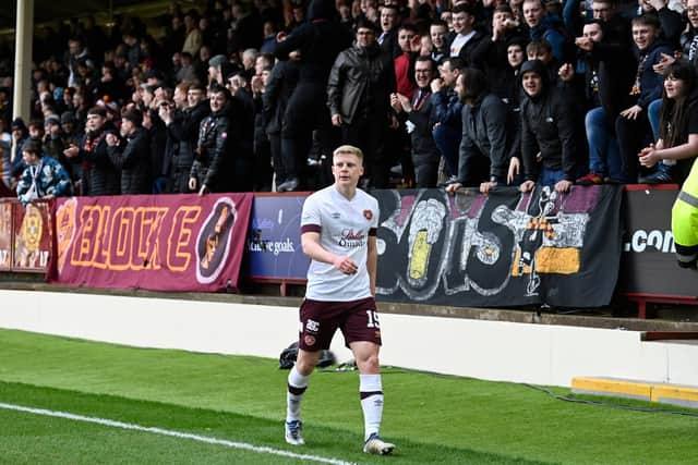 Hearts' Alex Cochrane walks around the pitch after he mistakenly thought he was being substituted during his side's match against Motherwell. Photo by Rob Casey / SNS Group