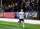 Hearts' Alex Cochrane walks around the pitch after he mistakenly thought he was being substituted during his side's match against Motherwell. Photo by Rob Casey / SNS Group