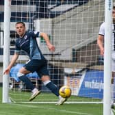 Raith Rovers striker Lewis Vaughan (L) checks with the linesman before celebrating his latest goal against Dunfermline on Saturday  (Photo by Paul Devlin / SNS Group)