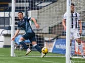 Raith Rovers striker Lewis Vaughan (L) checks with the linesman before celebrating his latest goal against Dunfermline on Saturday  (Photo by Paul Devlin / SNS Group)