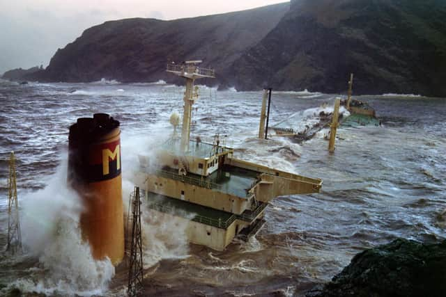 Oil gushes from the stricken Liberian-registered Braer tanker after it ran aground at Garths Ness on the Shetland Islands on January 5, 1992. (Photo by GERRY PENNY/AFP via Getty Images)