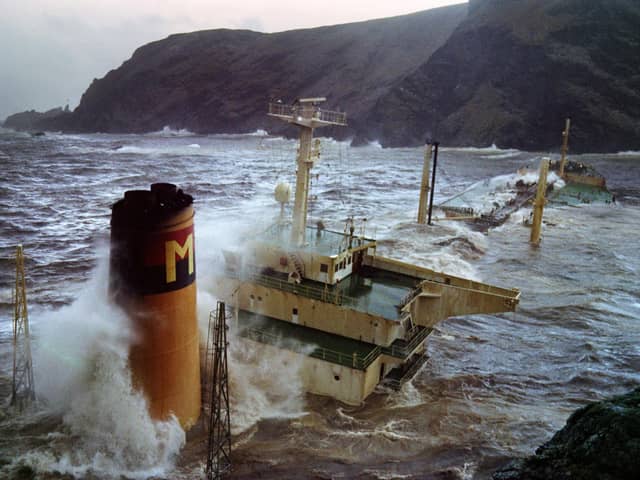 Oil gushes from the stricken Liberian-registered Braer tanker after it ran aground at Garths Ness on the Shetland Islands on January 5, 1992. (Photo by GERRY PENNY/AFP via Getty Images)