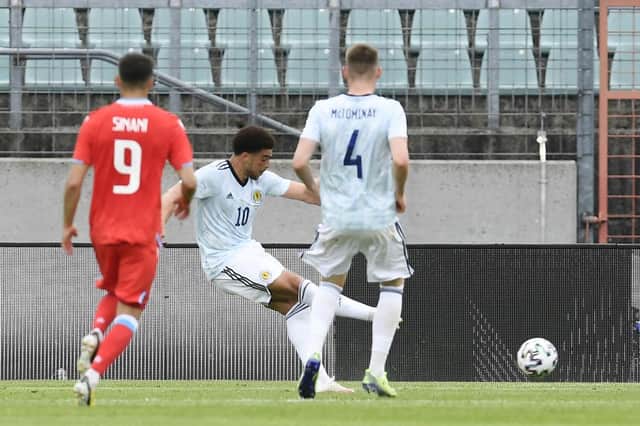Scotland forward Che Adams scoring during the friendly football match between Luxembourg and Scotland at the Josy Barthel Stadium in Luxembourg on June 6, 2021, in preparation for the UEFA 2020 European Championships. (Photo by JOHN THYS / AFP) (Photo by JOHN THYS/AFP via Getty Images)