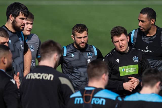 Glasgow Warriors players deep in discussion during preparations for the trip to Cardiff.  (Photo by Ross MacDonald / SNS Group)