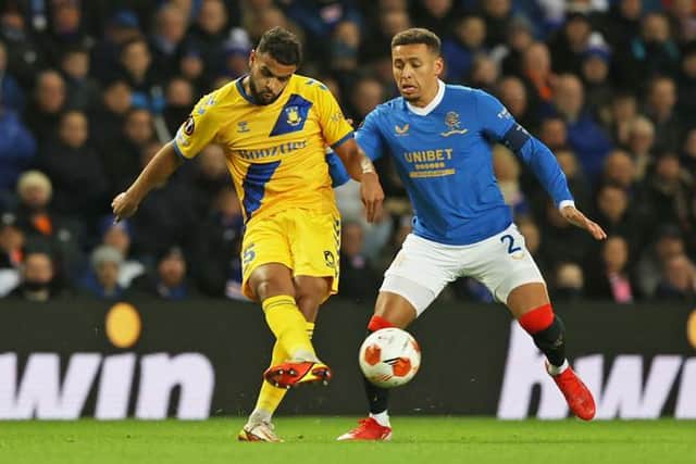 Brondby's Anis Ben Slimane (left) holds off Rangers' James Tavernier during the UEFA Europa League match at Ibrox. (Photo by Craig Williamson / SNS Group)