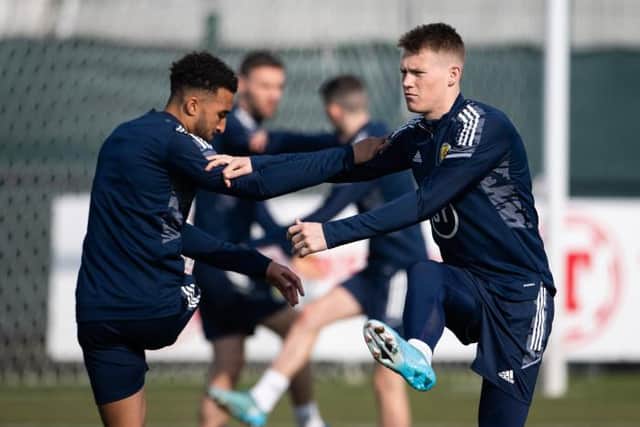 Scott McTominay (right) with Stoke City striker Jacob Brown (left) during Scotland's training session on Wednesday ahead of the Hampden friendly against Poland on Thursday. (Photo by Paul Devlin / SNS Group)