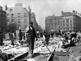 Long before the Trams to Newhaven project, construction workers installed the original tram lines on Leith Walk in 1904.
