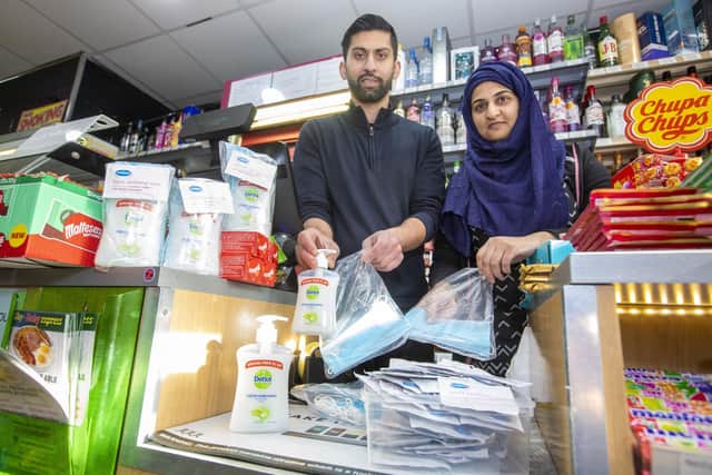 Shopkeepers Asiyah Javed and husband Jawad from Day Today Express, in Stenhousemuir, Falkirk