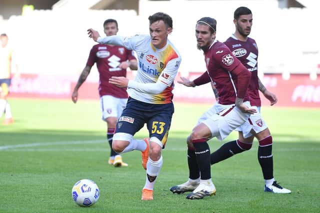 Liam Henderson in action for US Lecce during a Coppa Italia clash with Torino