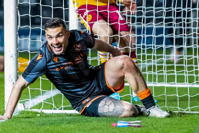 Dundee United's Tony Watt scored against his former club Motherwell in a 2-0 win.