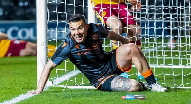 Dundee United's Tony Watt scored against his former club Motherwell in a 2-0 win.