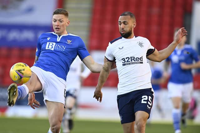St Johnstone's Liam Gordon and Kemar Roofe in action during a Scottish Premiership match between St Johnstone and Rangers at McDiarmid Park, on April 21, 2021, in Perth, Scotland. (Photo by Rob Casey / SNS Group)