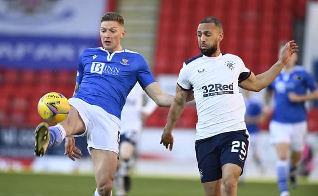 St Johnstone's Liam Gordon and Kemar Roofe in action during a Scottish Premiership match between St Johnstone and Rangers at McDiarmid Park, on April 21, 2021, in Perth, Scotland. (Photo by Rob Casey / SNS Group)