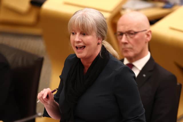 First Minister John Swinney looks on as Finance Secretary Shona Robison presents the Scottish Government's Budget. Picture: Jeff J Mitchell/Getty Images