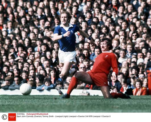 John Connolly in action for Everton against Liverpool's redoubtable Tommy Smith during a 1976 Merseyside derby. Picture: Colorsport/Shutterstock
