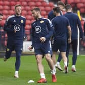 GLASGOW, SCOTLAND - NOVEMBER 14: Liam Cooper (centre) during Scotland National Team media access at Hampden Park, on November 14 in Glasgow.