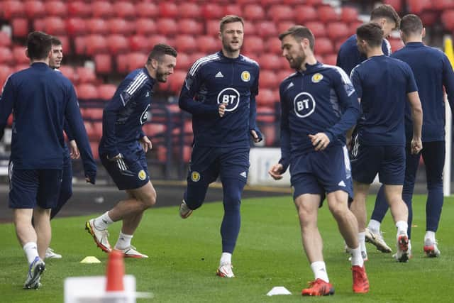 GLASGOW, SCOTLAND - NOVEMBER 14: Liam Cooper (centre) during Scotland National Team media access at Hampden Park, on November 14 in Glasgow.