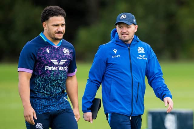 Scotland coach Gregor Townsend with centre Sione Tuipulotu during a training session at Oriam. (Photo by Ross Parker / SNS Group)