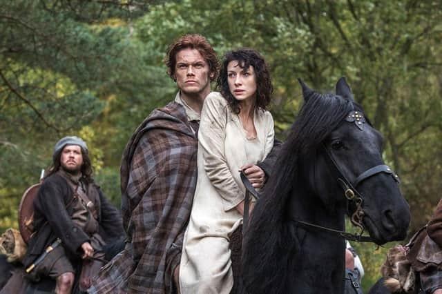 The ‘Dinna Fash Sassenach’ blog says that Jamie refers to Claire with this term of endearment to describe her as she bathes in the moonlight. The word is pronounced like “cullaman geeh-yal”.