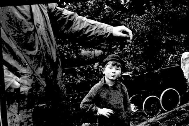A traveller boy poses for the camera at Johnstone's Encampment near Pitlochry in 1958. PIC: TSPL.