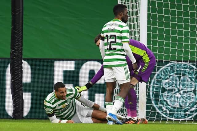 Celtic's Christopher Jullien collides with the goalposts and suffers an injury and is replaced during a Scottish Premiership match between Celtic and Dundee United at Celtic Park, on December 30, 2020, in Glasgow, Scotland. (Photo by Craig Foy / SNS Group)