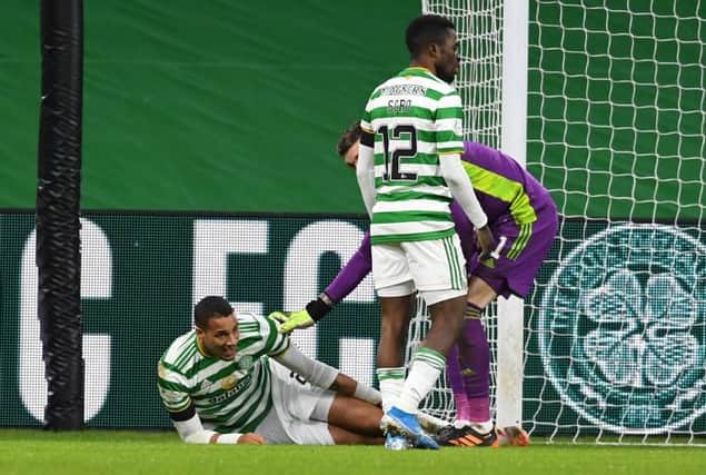 Celtic's Christopher Jullien collides with the goalposts and suffers an injury and is replaced during a Scottish Premiership match between Celtic and Dundee United at Celtic Park, on December 30, 2020, in Glasgow, Scotland. (Photo by Craig Foy / SNS Group)