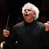 Sir Simon Rattle conducting the London Symphony Orchestra (PIC Doug Peters)