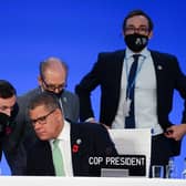 COP26 President Alok Sharma taking advice before postponing the latest session of the late-running conference today. Picture: Jane Barlow/PA Wire