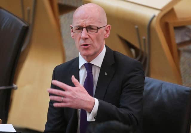 John Swinney has been unable to say exactly when the cash grants for struggling firms will be paid (Picture: Fraser Bremner /Getty)