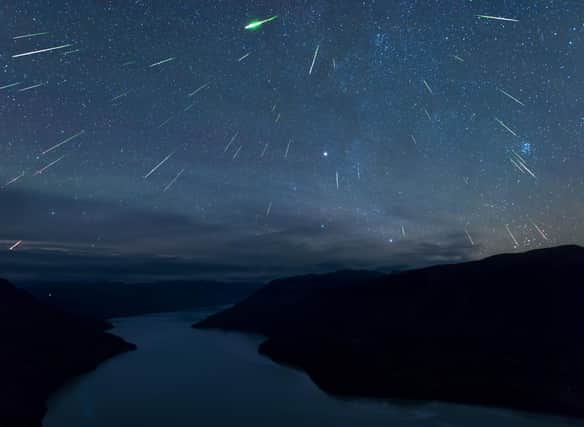 Make sure you raise your eyes to the night sky this weekend for the chance of catching the Draconid meteor shower in action. Photo: Zhuoxiao Wang / Getty Images / Canva Pro.