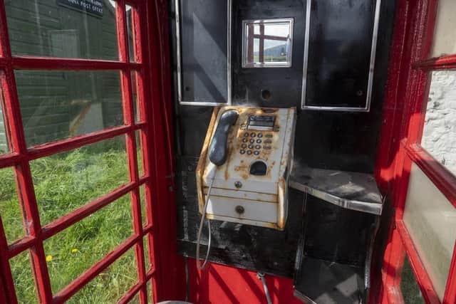 Residents have been campaigning for over a year to get the phone box fixed - with a message now relayed by BT that an engineer is due on the island on October 5. PIC: Andrew O'Brien.