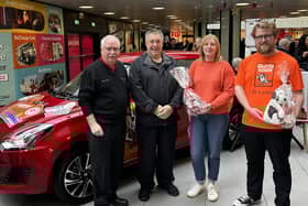 Alan Pirie, chairman of the organising committee; Gordon Arthur Irvine, milestone ticket holder, Carol McDonald from C&M McDonald and Ollie Middleton from Charlie House