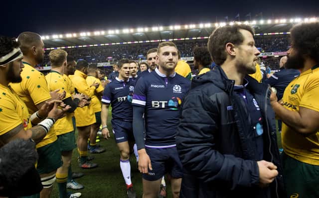 The Scotland players are given a guard of honour by Australia after their stunning 53-24 win in 2017. Picture: Gary Hutchison/SNS