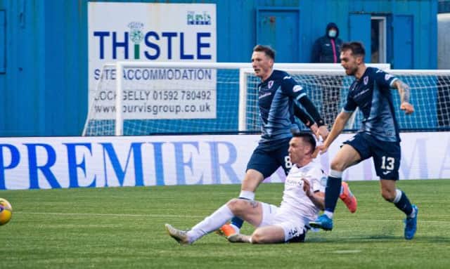 Dundee's Jordan McGhee scores to make it 2-0 during the Scottish Premiership play-off match between Raith Rovers and Dundee at Stark's Park on May 12, 2021, in Kirkcaldy, Scotland. (Photo by Euan Cherry / SNS Group)