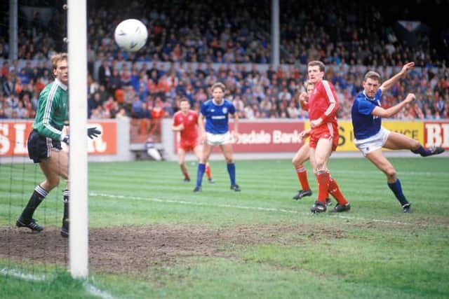Terry Butcher scores the goal against Aberdeen at Pittodrie which clinched a first league title in nine years for Rangers in May 1987. (Photo by SNS Group).