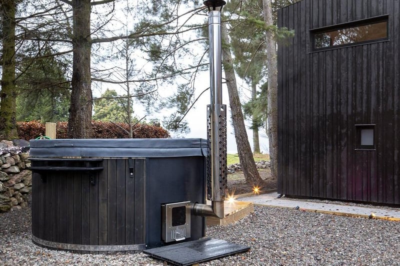 The back garden of Coorie has a hot tub - perfect for stargazing on a clear night.