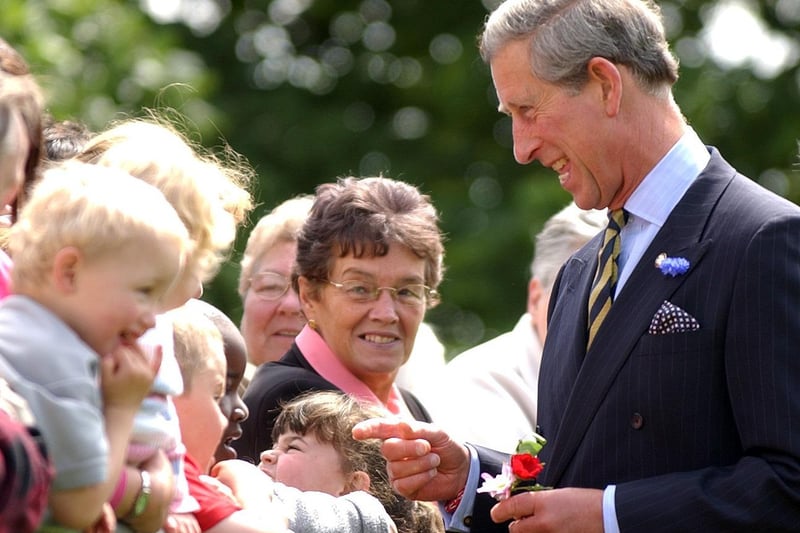 Prince Charles chatting to local people who gathered to see him during a visit to Sighthill Youth Centre in Glasgow in June 2003.
