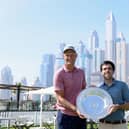 Pole Adrian Meronk is presented with the 2023 Seve Ballesteros Award by the Spaniard's son Javier on the driving range at Emirates Golf Club ahead of his appearance in this week's Hero Dubai Desert Classic. Picture: Richard Heathcote/Getty Images.