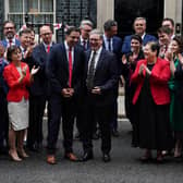 Prime Minister Sir Keir Starmer (centre right) and Scottish Labour leader Anas Sarwar (centre left) pose for a photograph with the new intake of Scottish Labour MPs outside no 10 Downing Street.