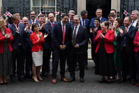 The Scottish Labour MPs outside Downing Street with Keir Starmer and Anas Sarwar after the general election victory
