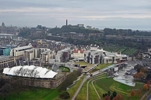 The decision on a new income tax band will be announced at the Scottish Parliament on Tuesday. Picture: Jeff J Mitchell/Getty Images