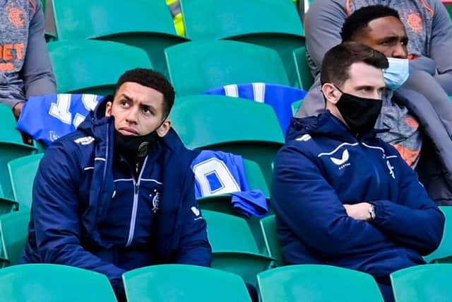 James Tavernier looks on from the Celtic Park stand along with fellow injury absentee Ryan Jack during the 1-1 draw in the Old Firm match last weekend. (Photo by Rob Casey / SNS Group)