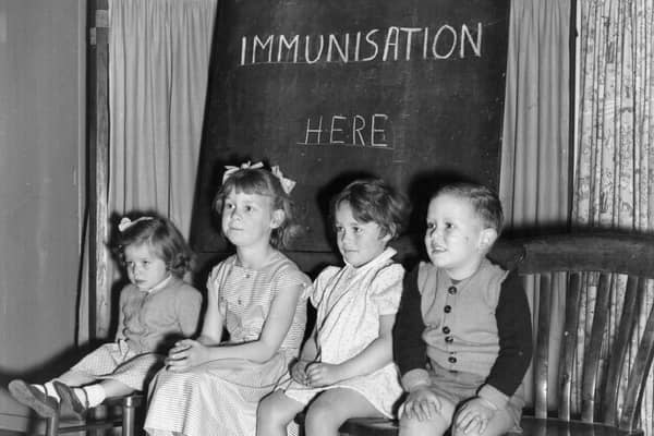 Four young children wait to be immunised against polio after a pandemic hit the UK in the 1940s and 1950s  (Photo by Terry Fincher/Getty Images)