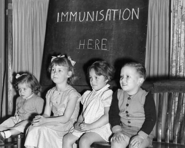 Four young children wait to be immunised against polio after a pandemic hit the UK in the 1940s and 1950s  (Photo by Terry Fincher/Getty Images)